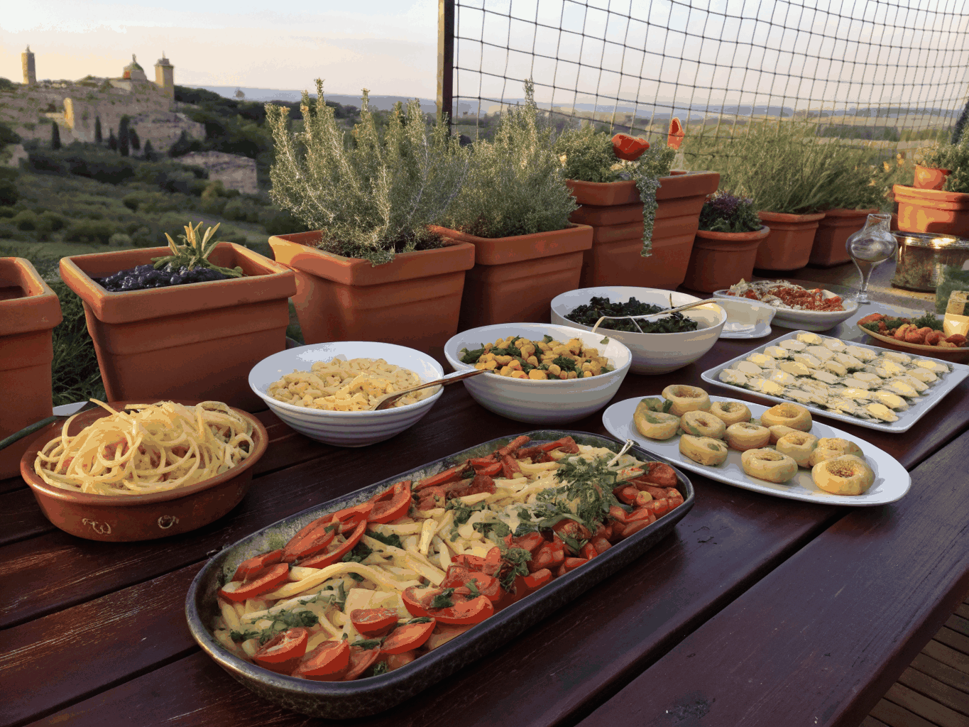 Lavish rustic Italian antipasti spread with charcuterie, artisanal cheeses, and fresh focaccia